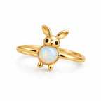 Bague Lapin Opale dorée sur fond blanc