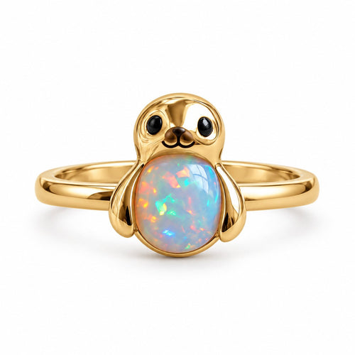 Bague Phoque Opale dorée sur fond blanc