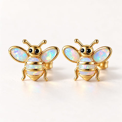 Boucles d'oreilles Abeille Mopaline, paire vue de face sur fond clair