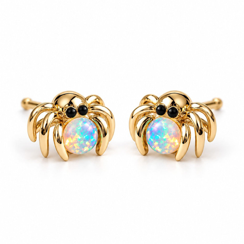 Boucles d'oreilles Araignée Opale dorées, la paire sur fond blanc