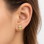 Boucle d'oreille Astronaute Opale portée sur le lobe