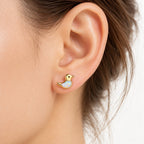 Boucle d'oreille Canard Opale portée sur le lobe