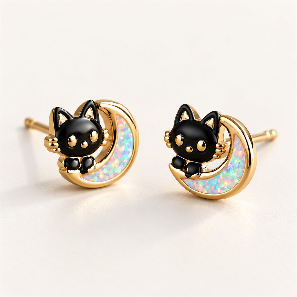 Boucles d'oreilles Chat Lune Mopaline, paire vue de face sur fond clair