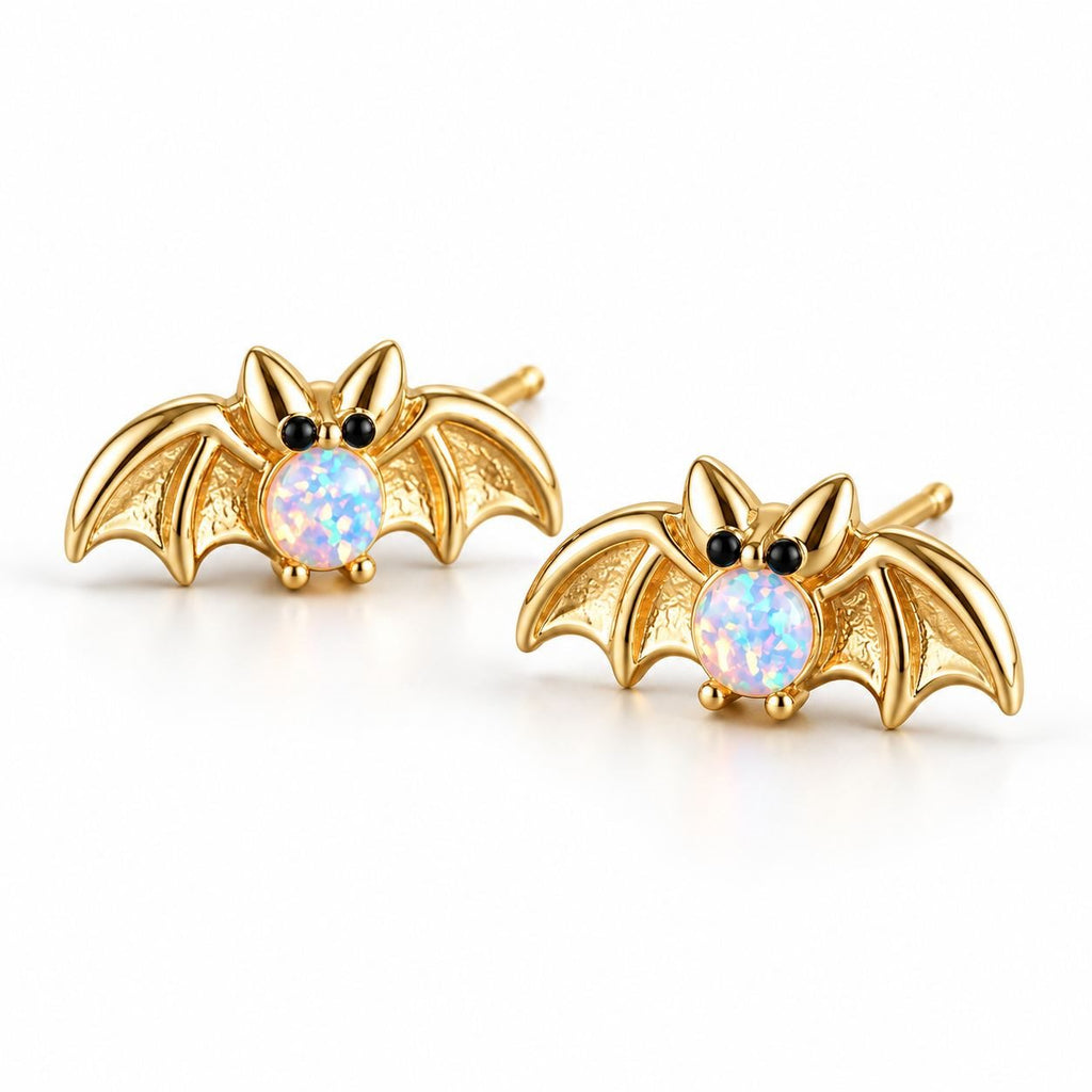 Boucles d'oreilles Chauve-souris Opale dorées, la paire sur fond blanc