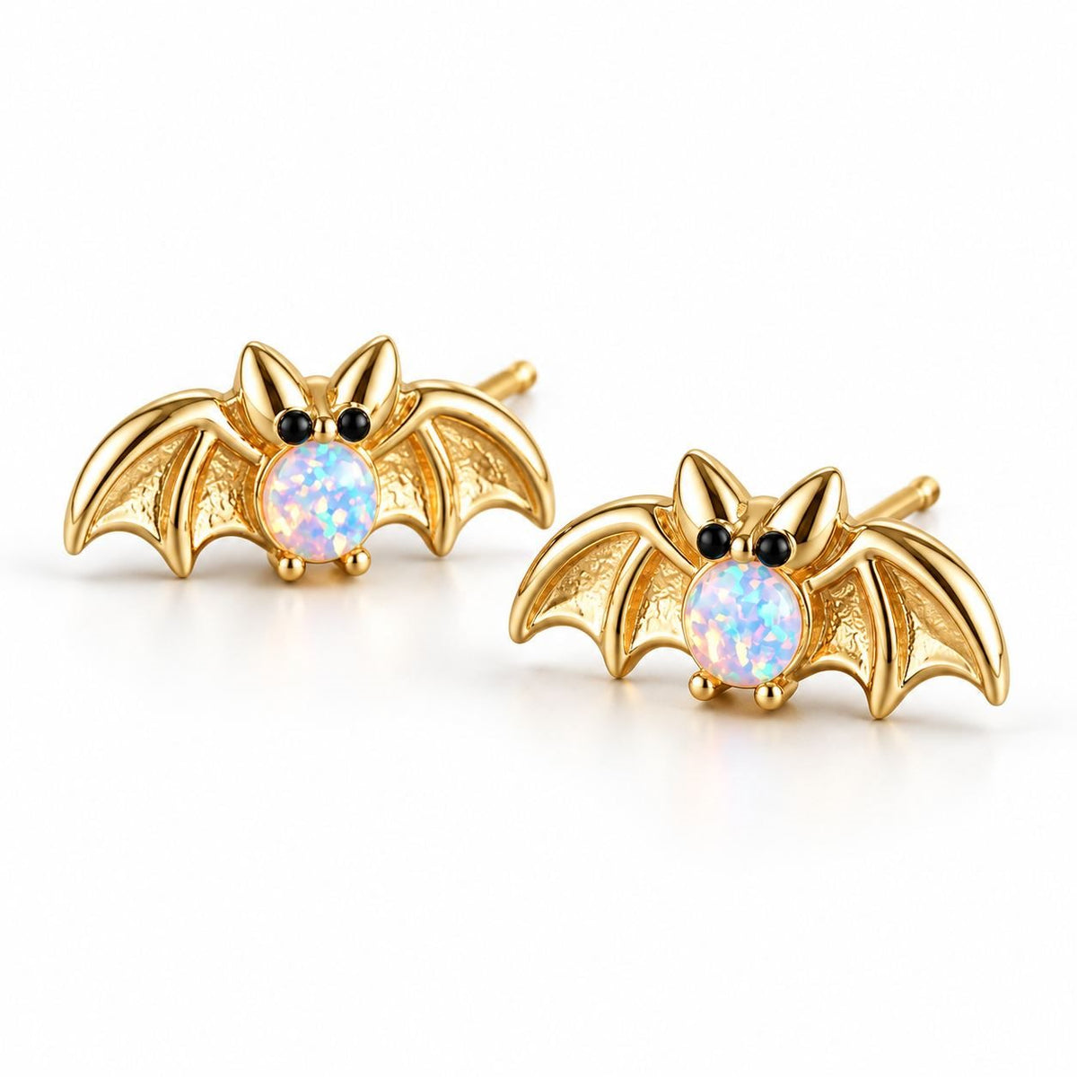 Boucles d'oreilles Chauve-souris Opale dorées, la paire sur fond blanc