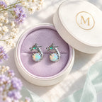 Boucles d'oreilles Dragon Mopaline, présentées dans leur coffret cadeau