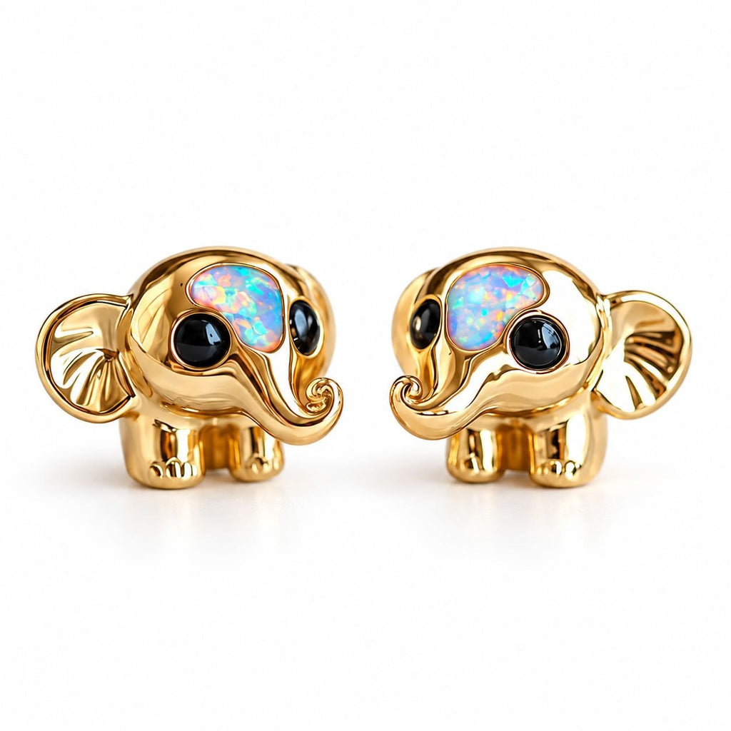 Boucles d'oreilles Éléphant Opale dorées, la paire sur fond blanc
