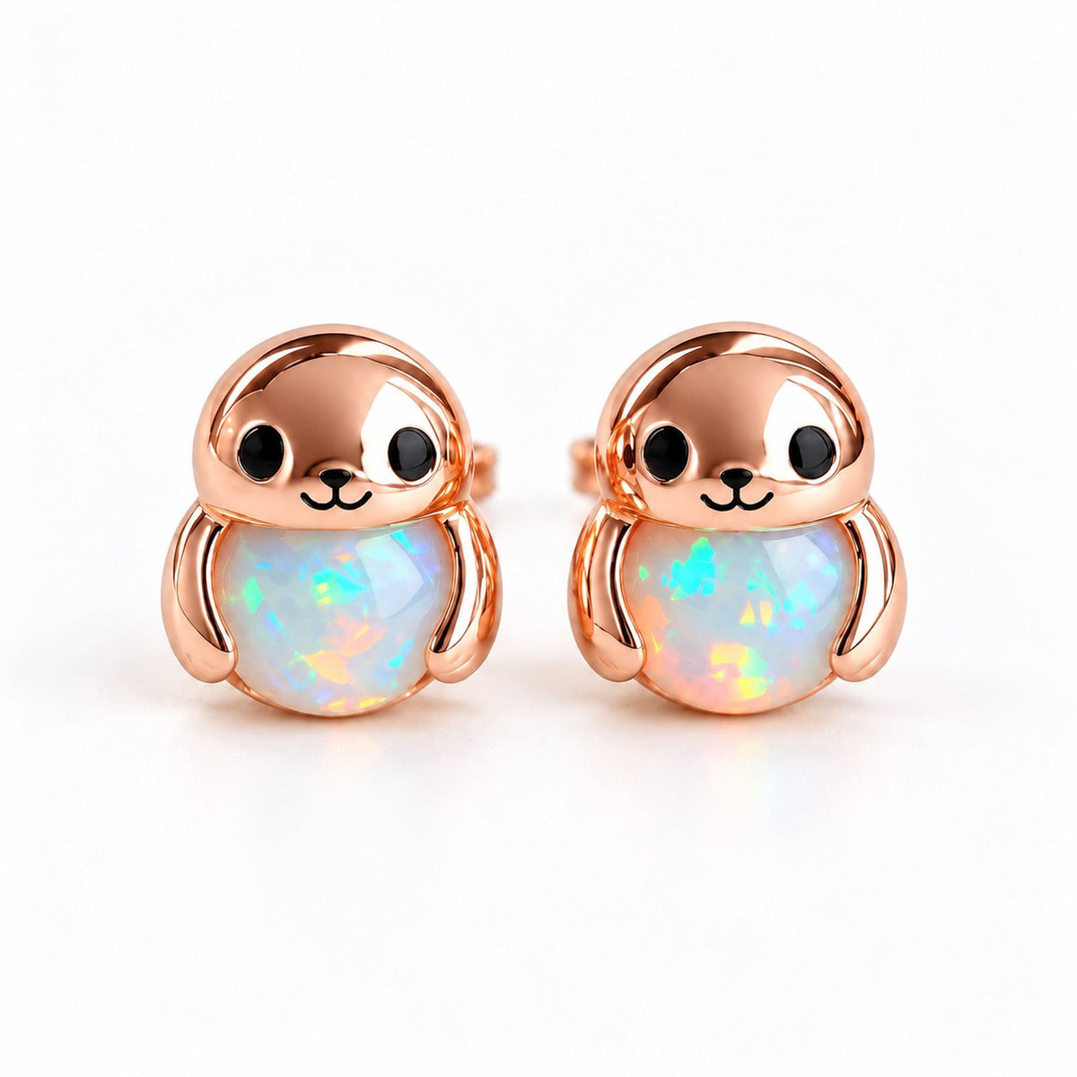 Boucles d'oreilles Phoque Opale or rose, la paire sur fond blanc