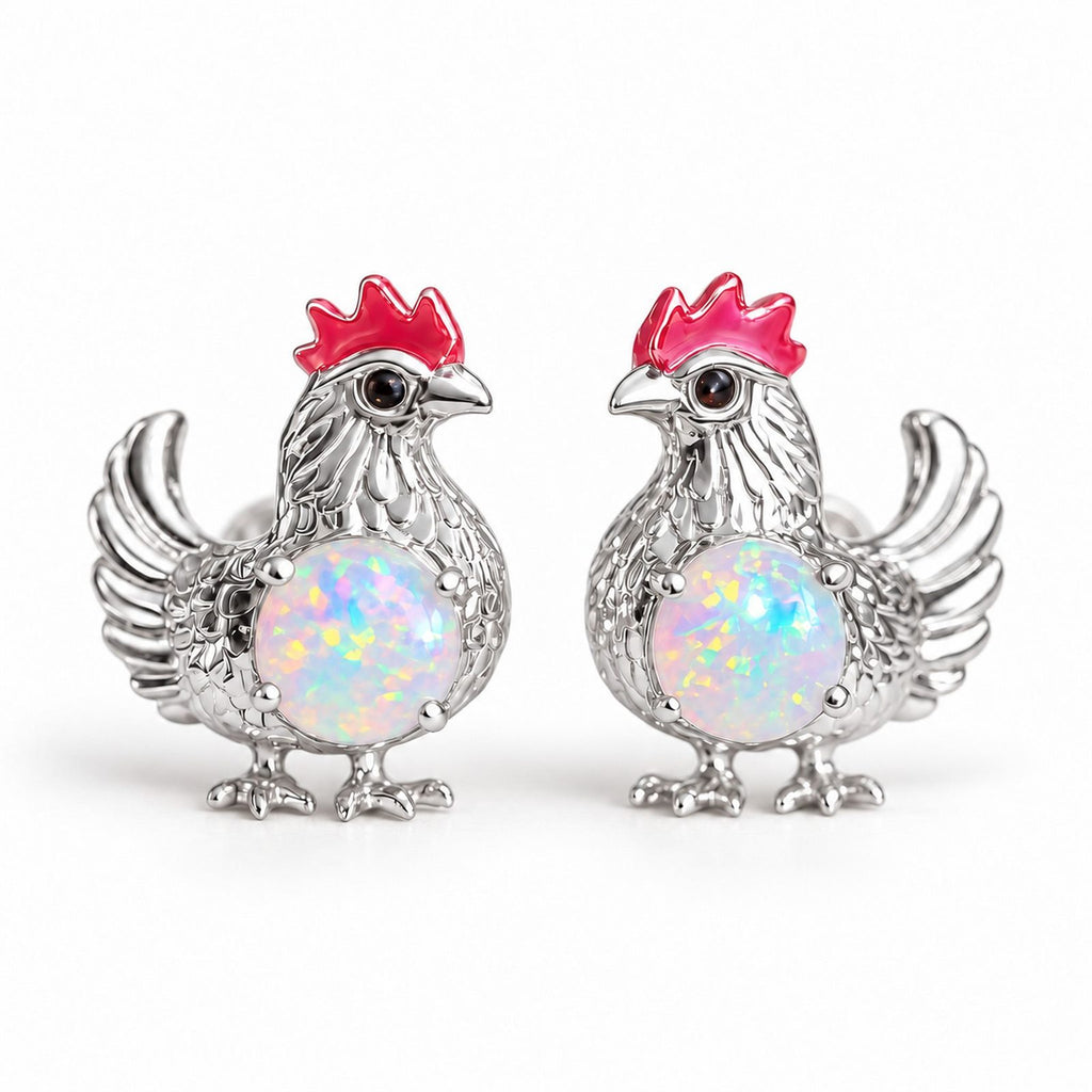 Boucles d'oreilles Poule Opale argentées, la paire sur fond blanc