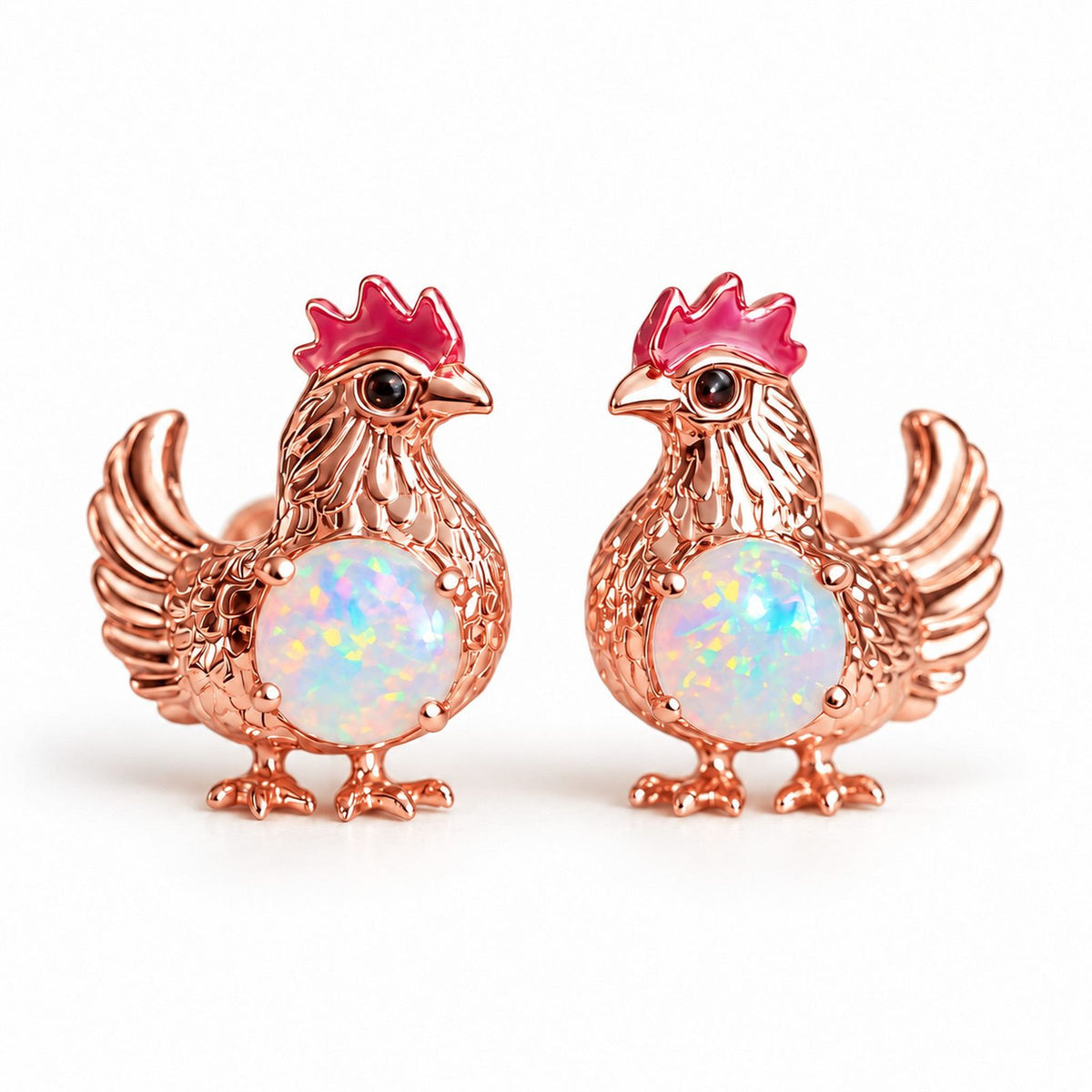 Boucles d'oreilles Poule Opale or rose, la paire sur fond blanc