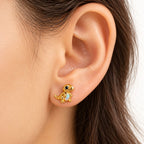 Boucle d'oreille T-Rex Opale portée sur le lobe