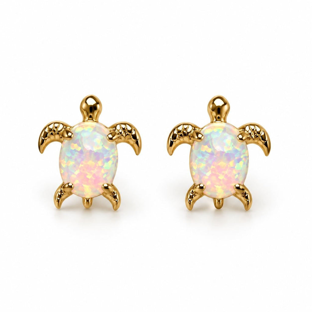 Boucles d'oreilles Tortue Opale dorées, la paire sur fond blanc